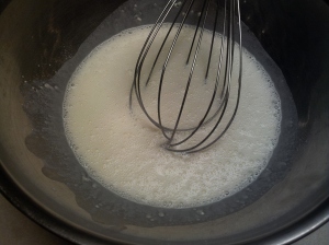 Whisking together the half and half and flour